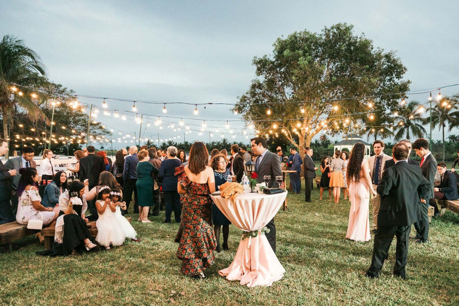 outdoor wedding reception with string lights powered by generator in Kelowna BC