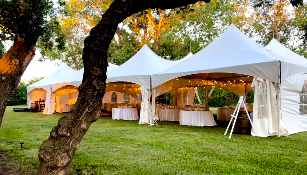 large marquee tent rental BC setup for corporate outdoor event with tables and chairs